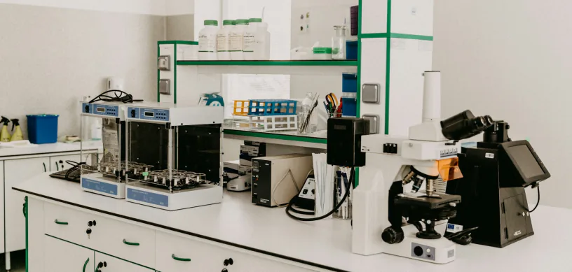 University research laboratory with microscope and equipment for PhD students