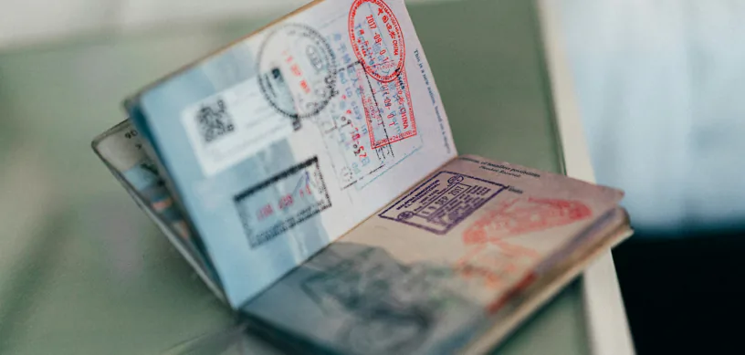 Passport with visa stamps for a UK student visa
